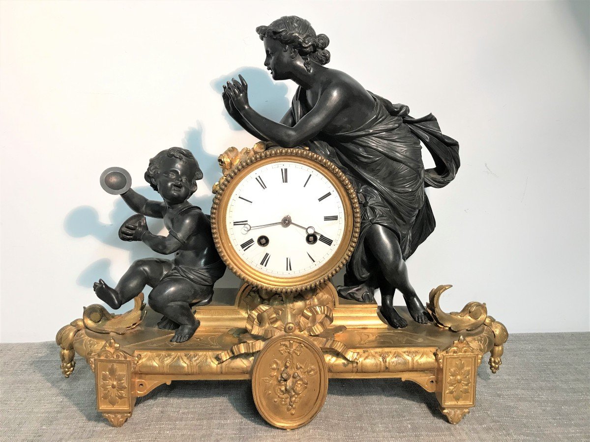 Pendule romantique en bronze époque Napoléon III