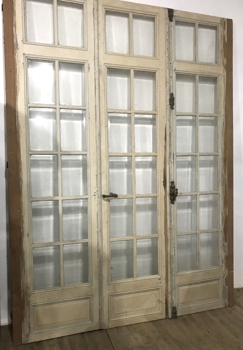 Set Of Three Antique Doors With Hinged Panels