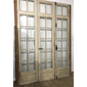 Set Of Three Antique Doors With Hinged Panels