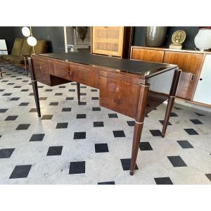 Bureau plat de milieu Art-Deco en bois de palmier et ivoire attribué à Jules Leleu