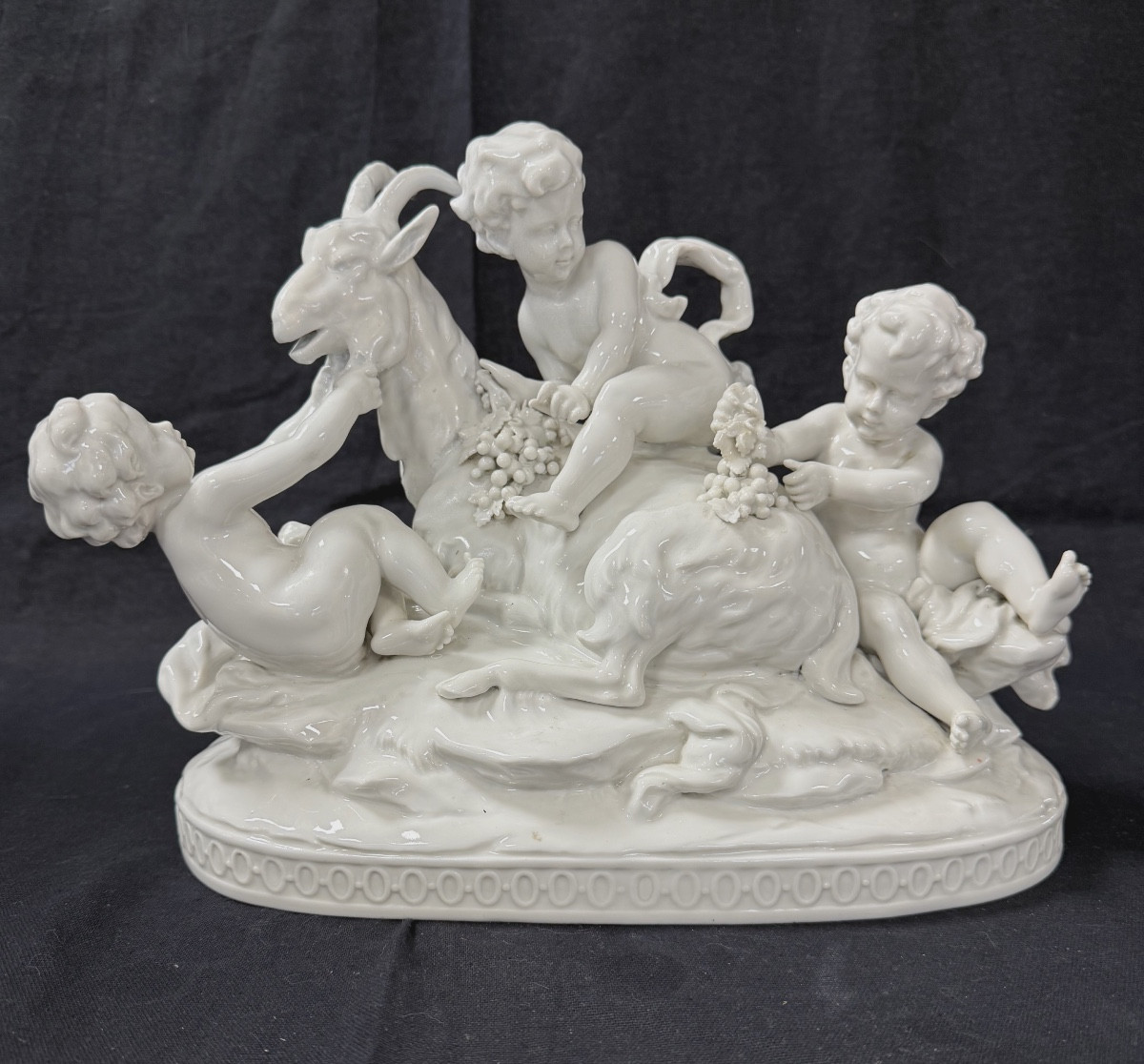 Capodimonte Sculpture Of Cherubs Playing With A Goat