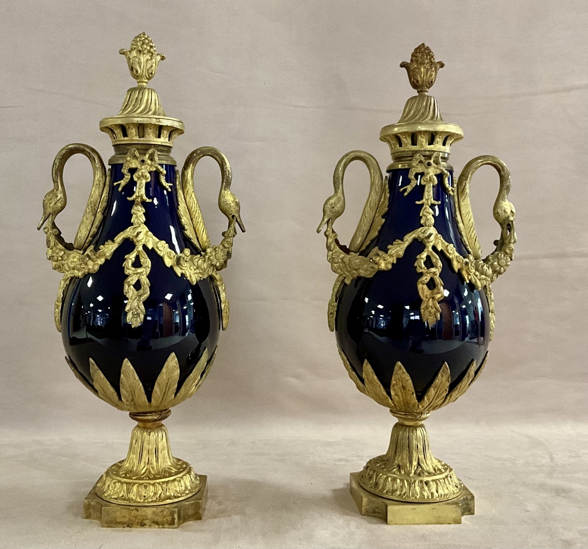 Pair Of Lidded Porcelain And Bronze Vases