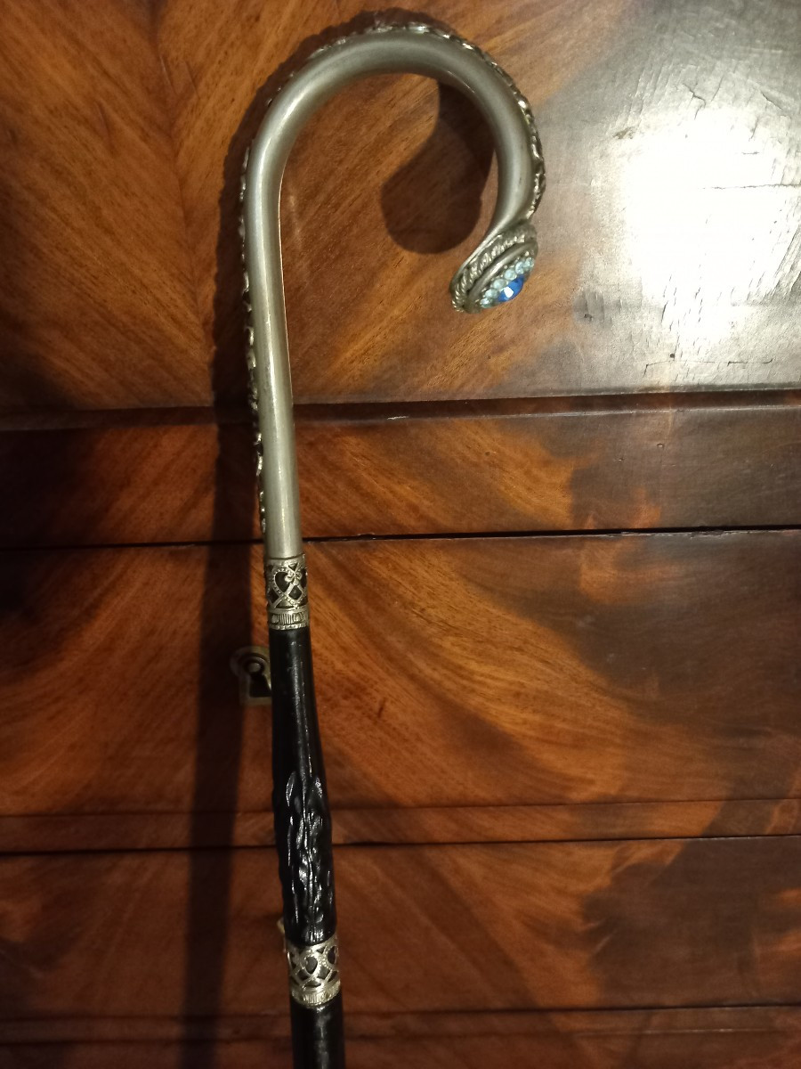 Elégante canne '1900' en ébène, argent et topaze.-photo-2