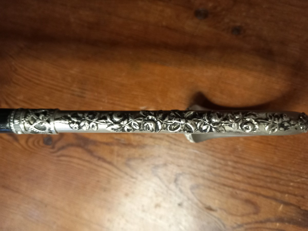 Elégante canne '1900' en ébène, argent et topaze.-photo-2