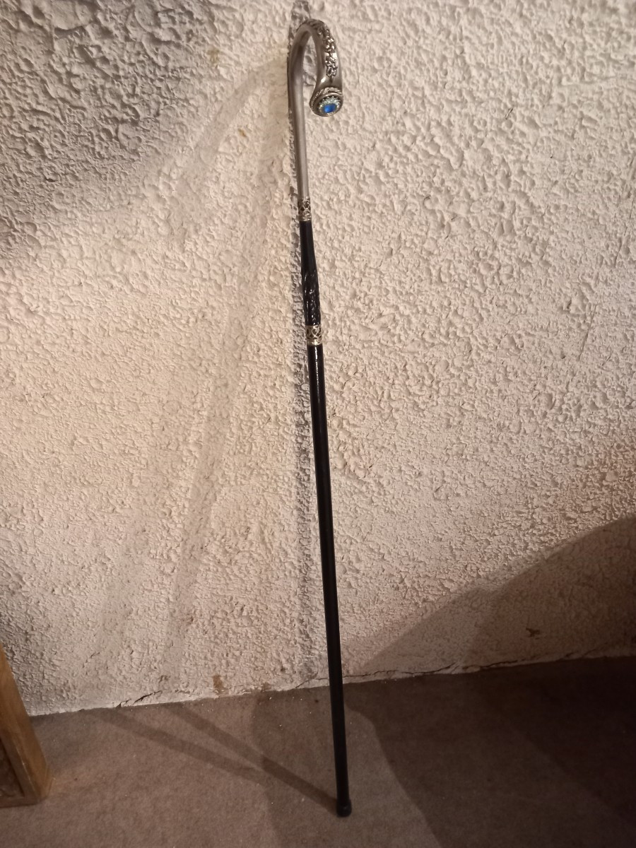 Elégante canne '1900' en ébène, argent et topaze.-photo-5