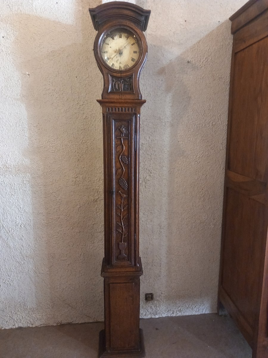 Horloge normande dite "tête de poupée ", d'époque 18ème. 