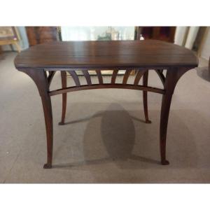 Table de milieu Art Nouveau, Gustave Serrurier- Bovy, en acajou.
