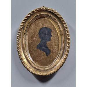Miniature en verre églomisé, profil silhouette sur fond or – Époque Charles X
