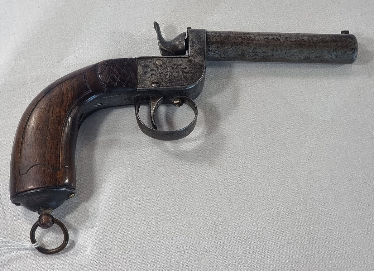 Pistolet de poche monocoup atypique du XIXe siècle.