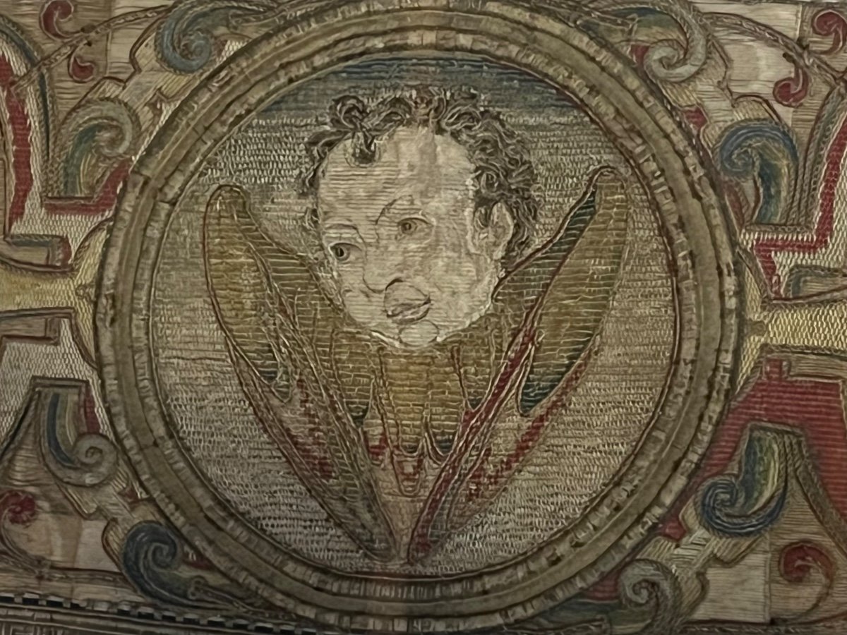Embroidery Depicting A Cherub's Head.-photo-1