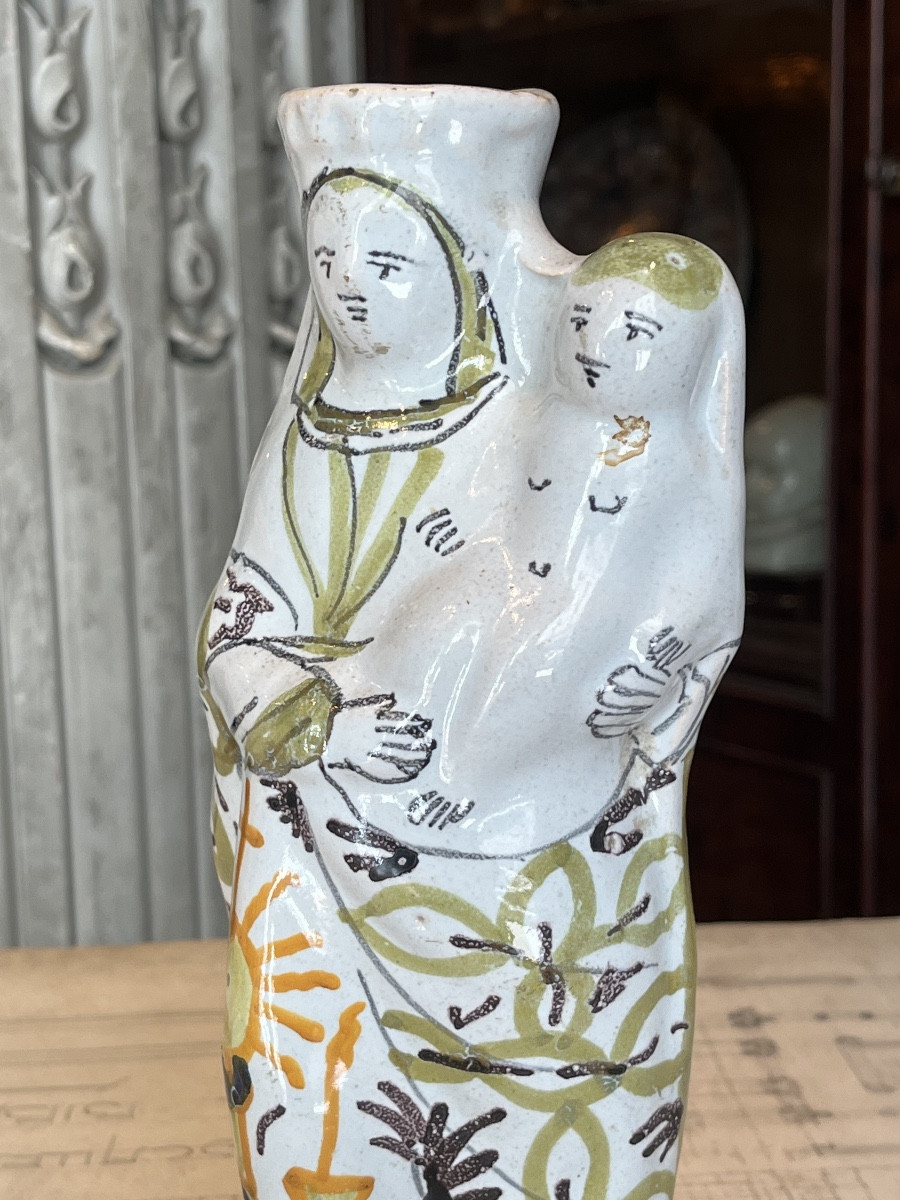 Virgin Mary Holding The Child In Her Arms-photo-1