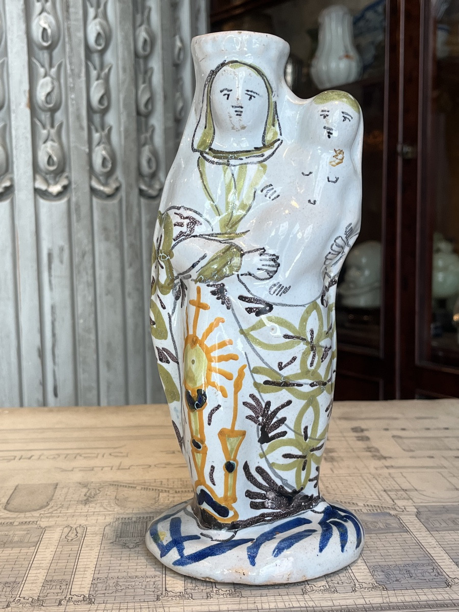 Virgin Mary Holding The Child In Her Arms-photo-2