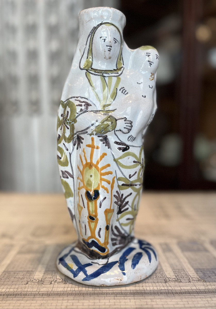 Virgin Mary Holding The Child In Her Arms