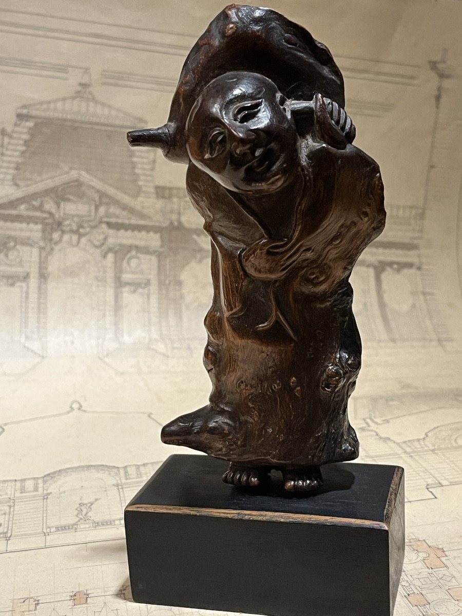 Racine d’arbre sculpté figurant un Chinois .