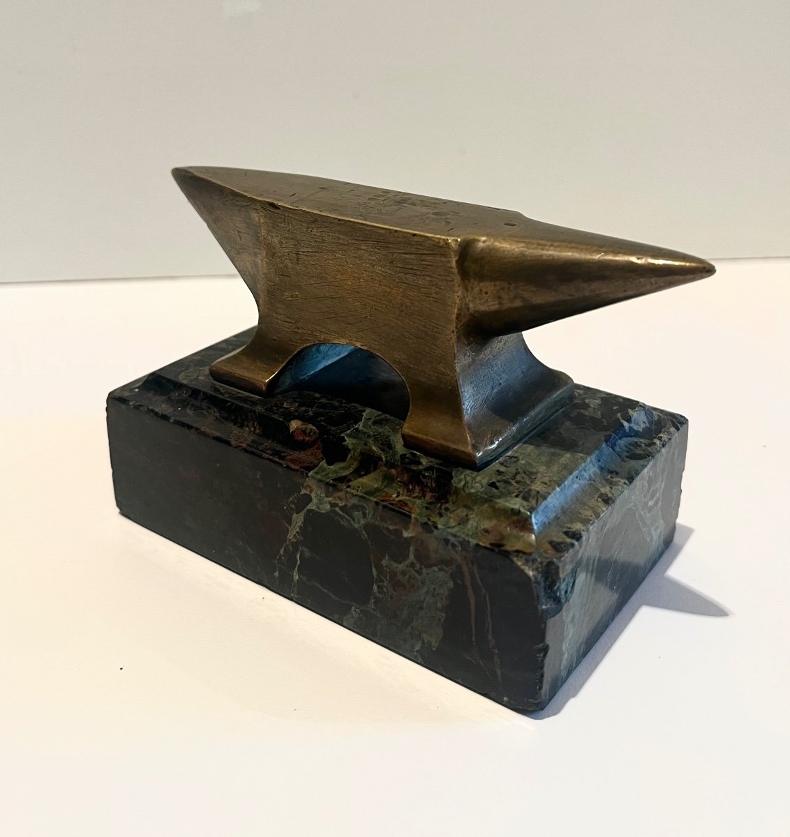 Small Bronze Jeweler's Anvil On A Sea Green Marble Base-photo-8