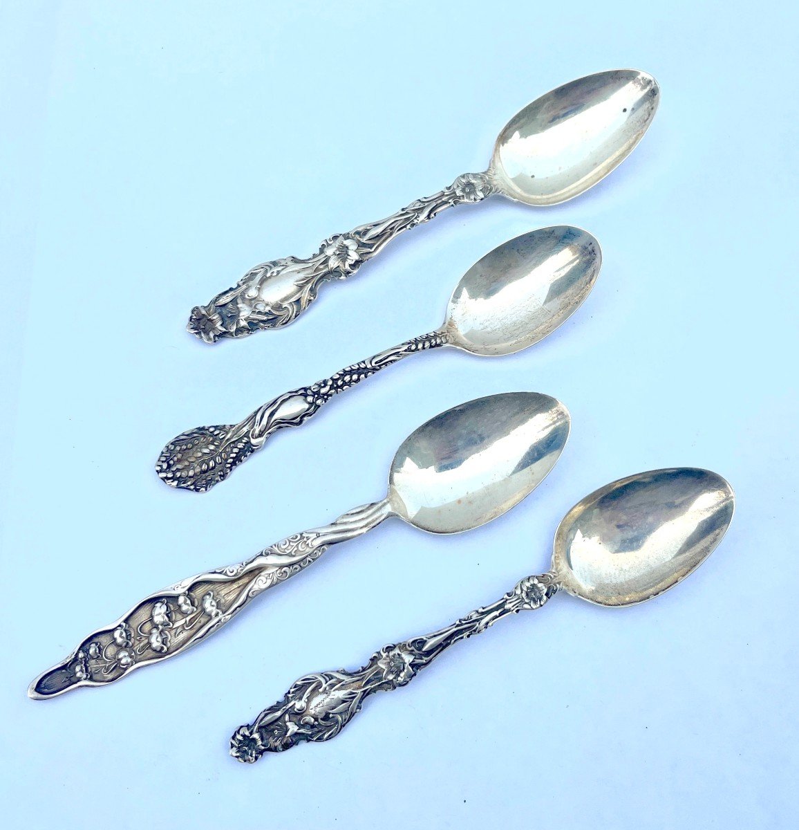 Four Sterling Silver Art Nouveau Spoons