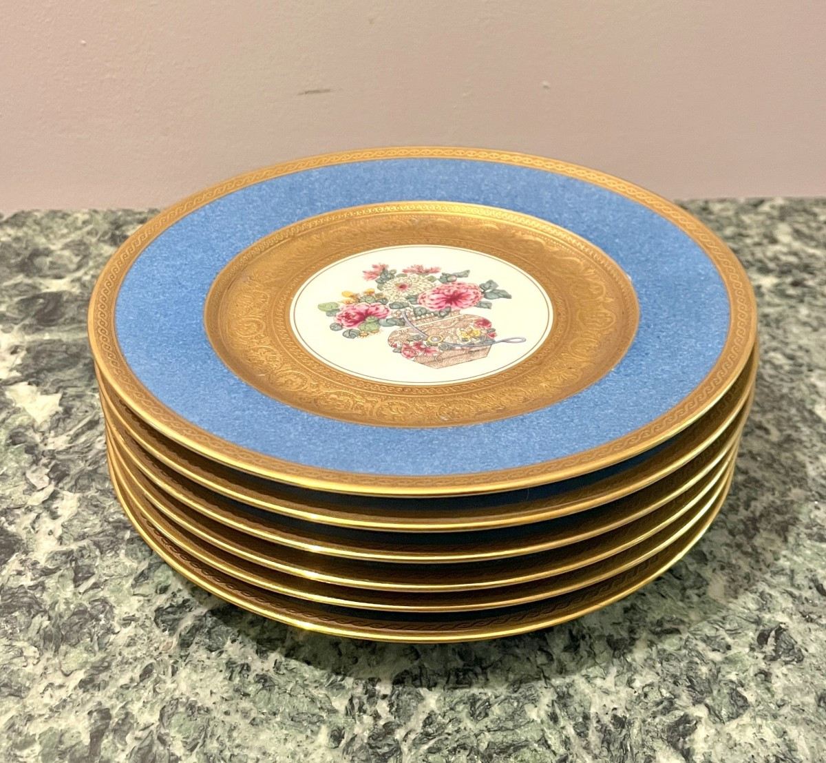 Six assiettes en porcelaine E. Bourgeois Paris