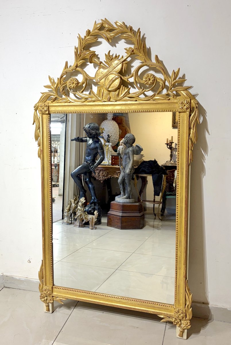 Grand miroir en bois sculpté et doré de style LXVI-photo-2