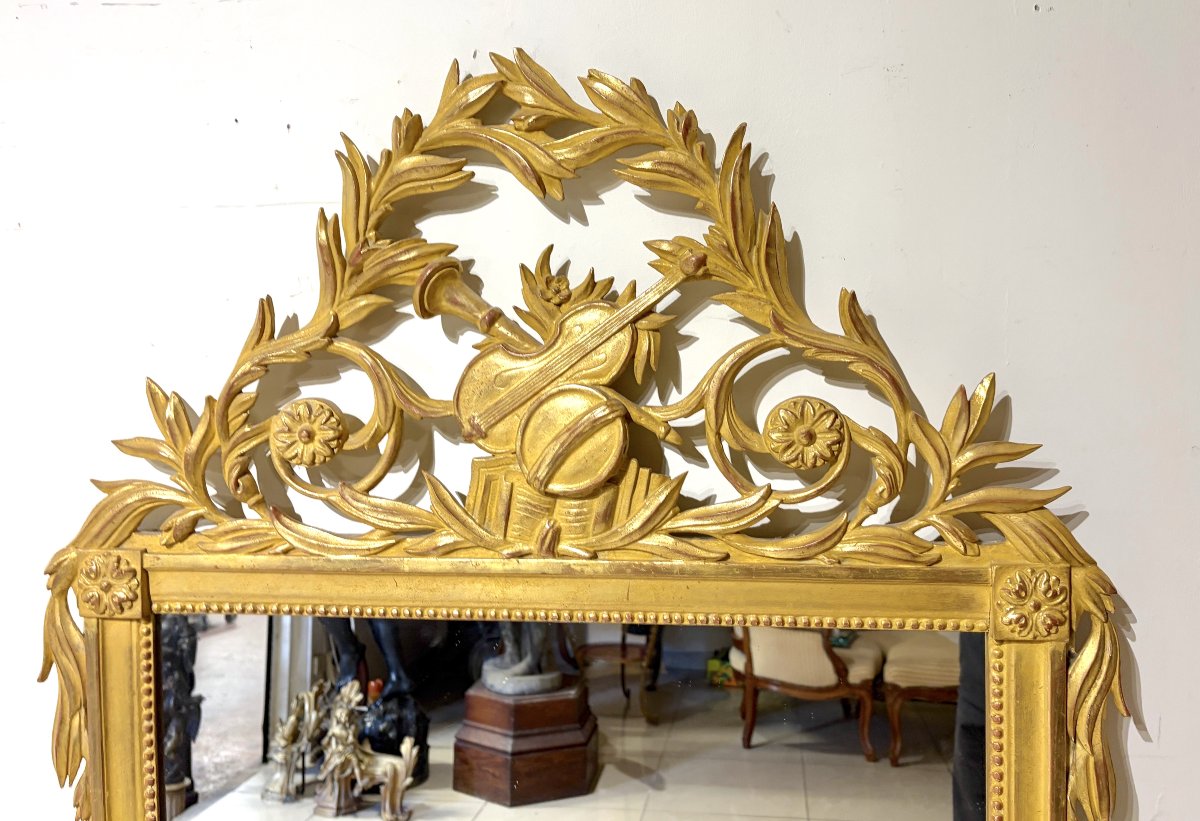 Grand miroir en bois sculpté et doré de style LXVI-photo-2