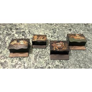 Four Asian-themed Matchbox Lighters