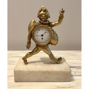 Petite pendule polichinelle en bronze doré XVIIIème