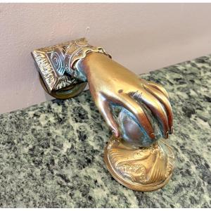 Bronze Door Knocker Shaped Like A Hand