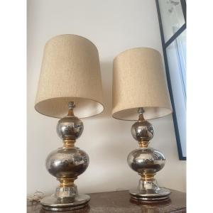 PAIRE DE LAMPES EN CERAMIQUE ARGENTE ET DORE