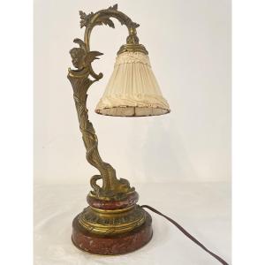LAMPE EN BRONZE ET MARBRE A  DECOR D'UN POISSON