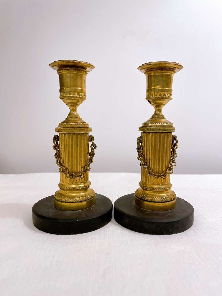 Pair Of Empire Candlesticks, Early 19th Century, In Gilt Bronze