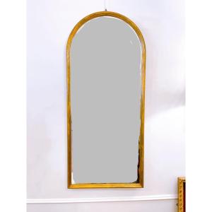 Miroir mural en arc en bois doré 