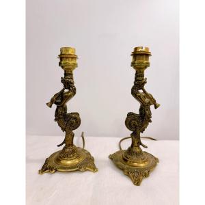 Paire de petites lampes à décor Tritons