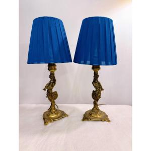 Paire de petites lampes à décor Tritons