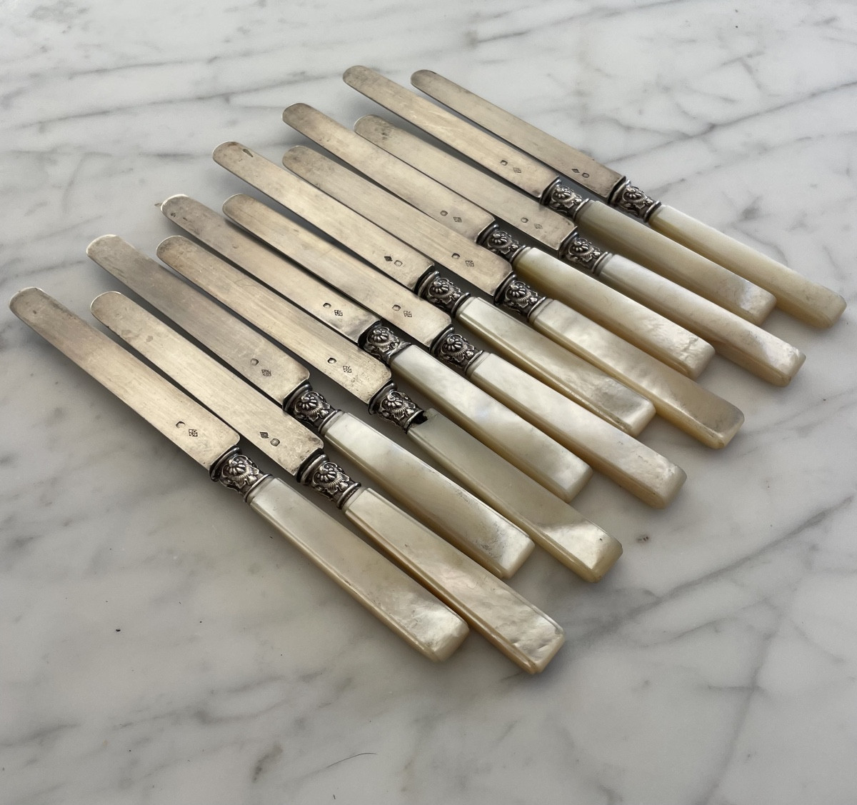 Set Of Twelve Dessert Knives With Mother-of-pearl Handles And Solid Silver Blades 
