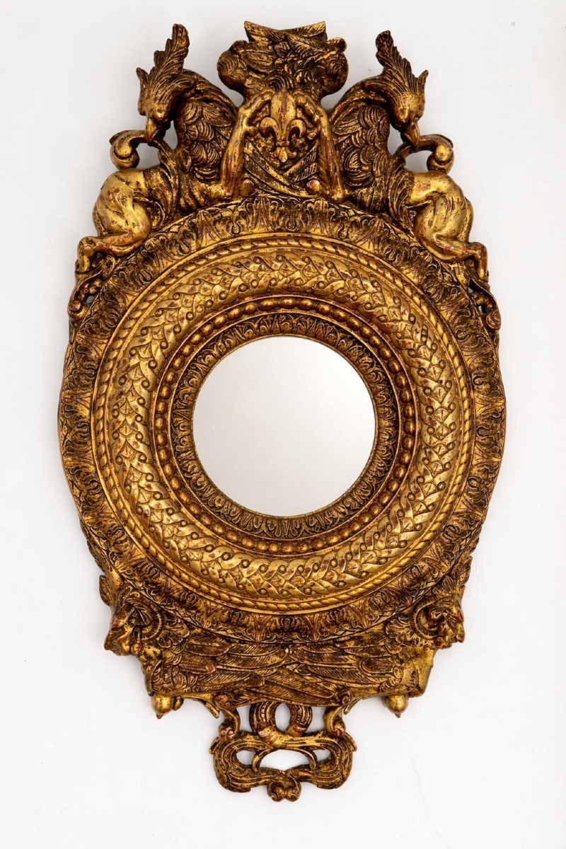 Miroir en bois doré de style baroque 