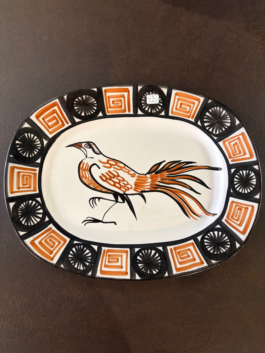 ROBERT PICAULT. Plat ovale en céramique à décor oiseau et frise géométrique
