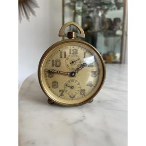 Zenith. Alarm Clock In Golden Brass Circa 1930