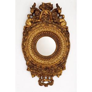 Miroir en bois doré de style baroque 