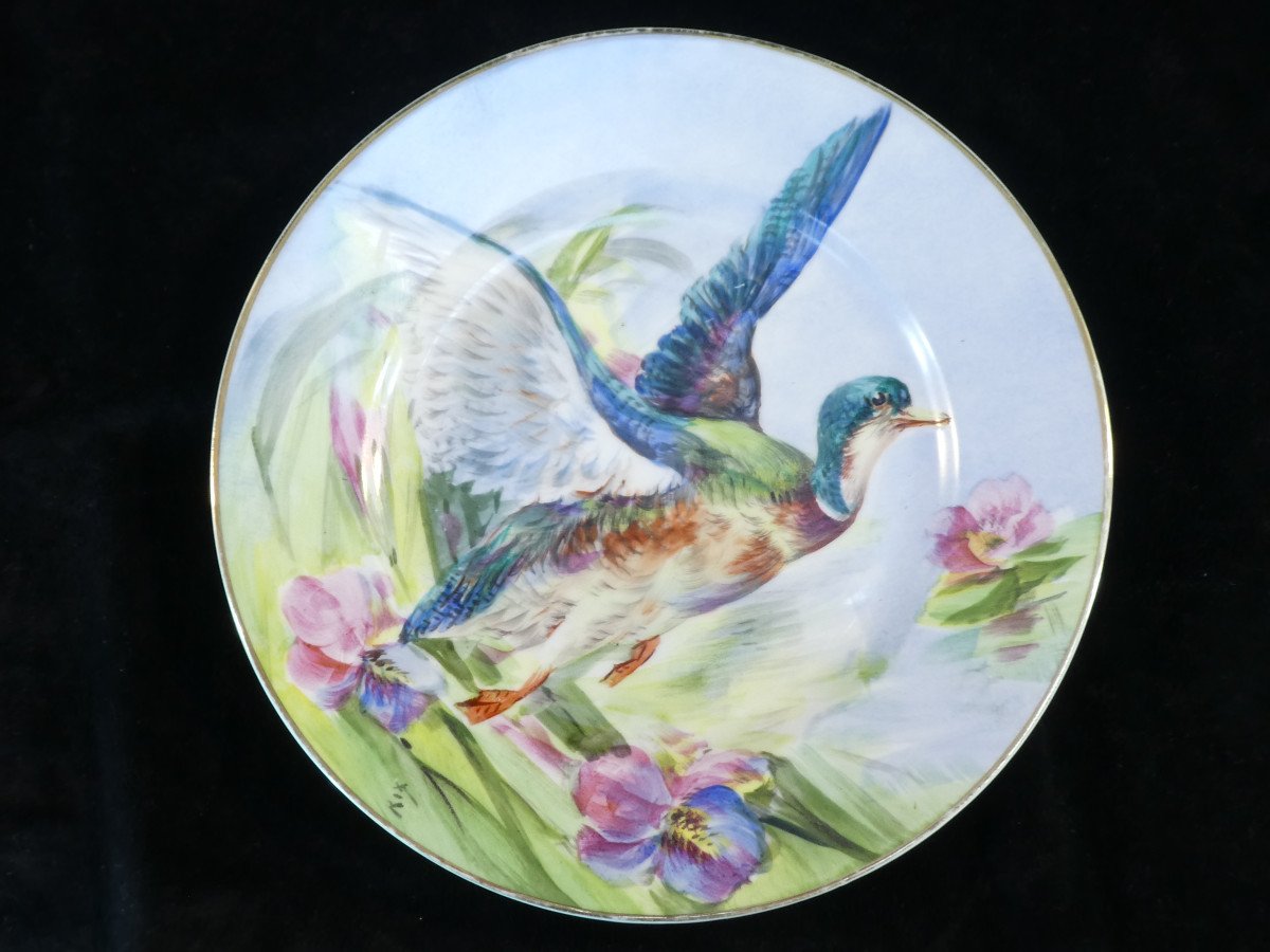 Assiette en Porcelaine de LIMOGES décor au canard 