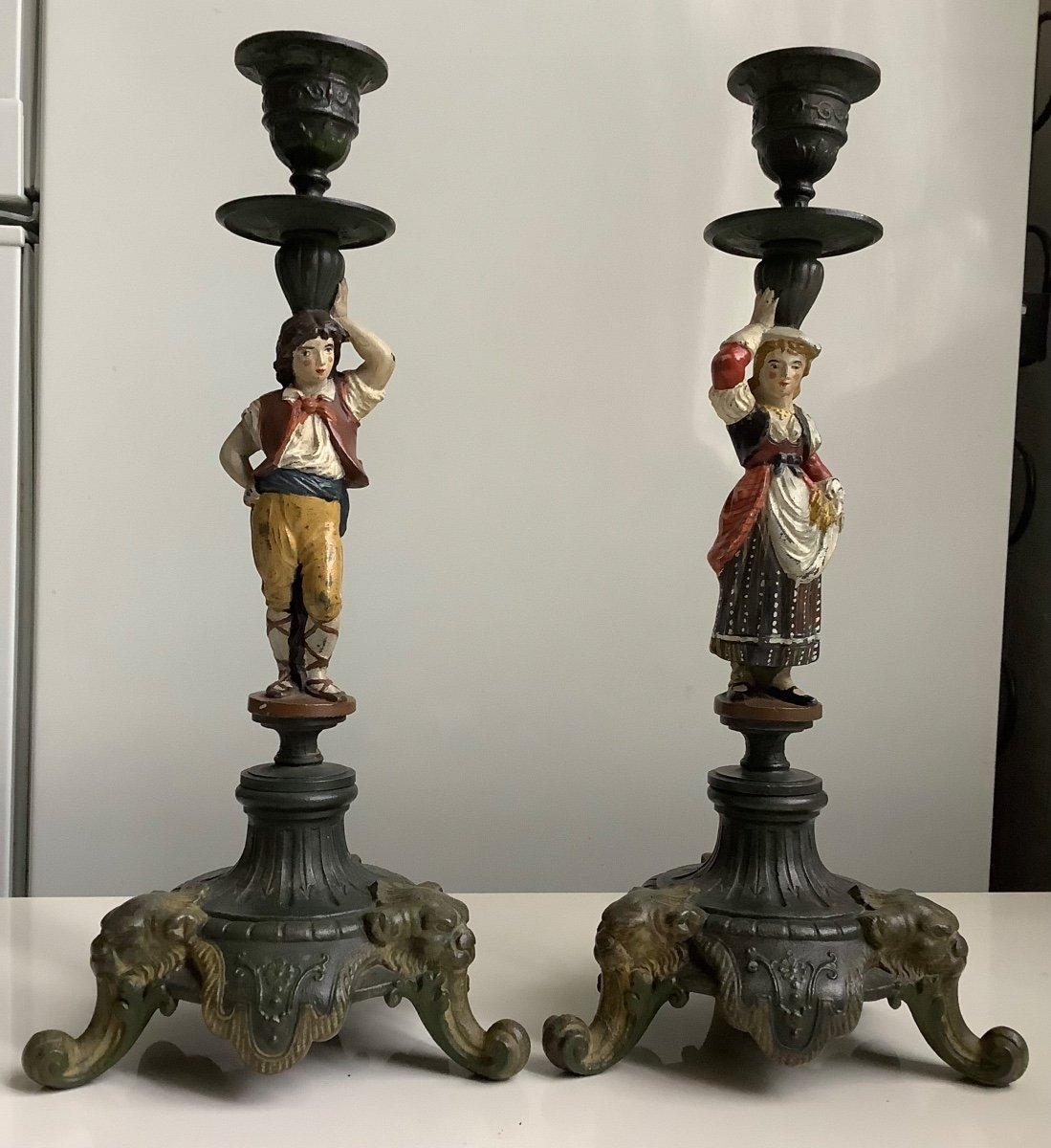 A Pair Of Candlesticks In Spelter Painted Decor Of Characters