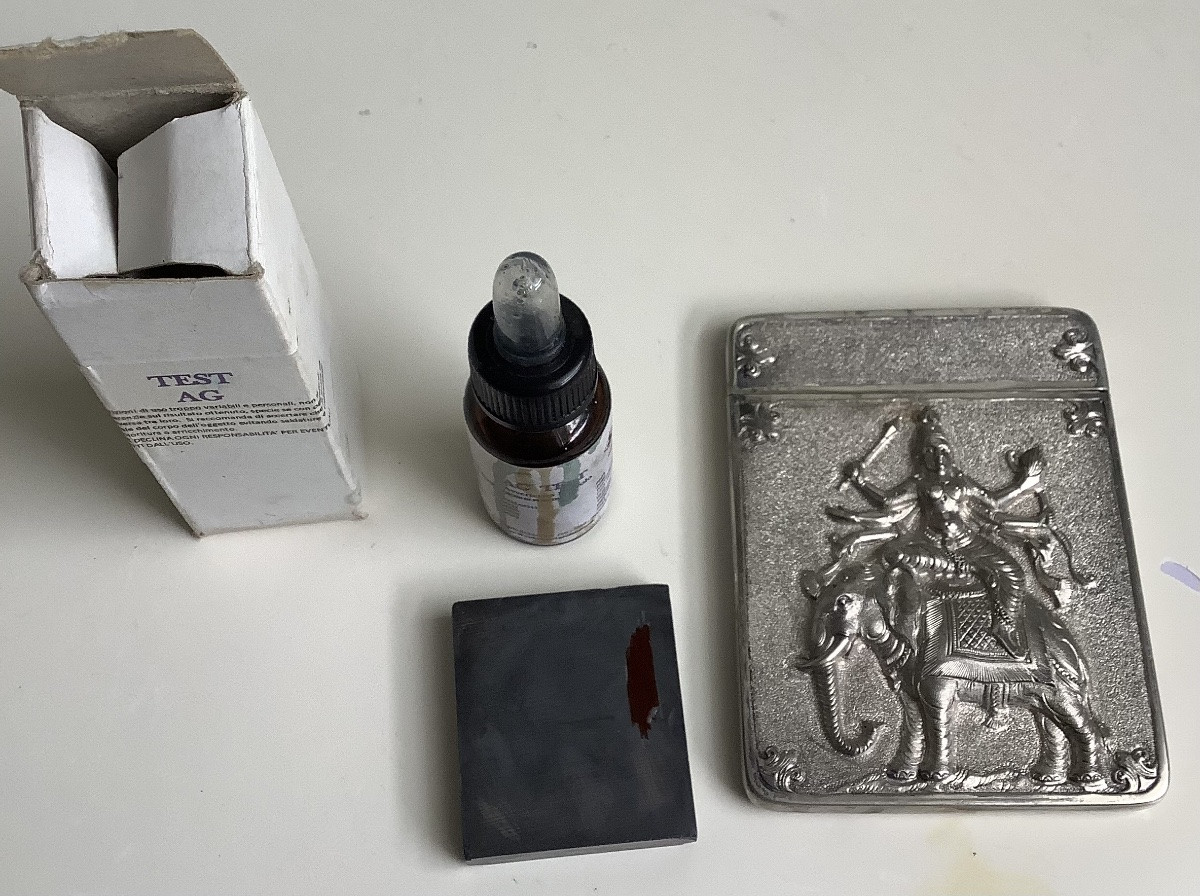 A Silver Business Card Decorated With Shiva On An Elephant -photo-2