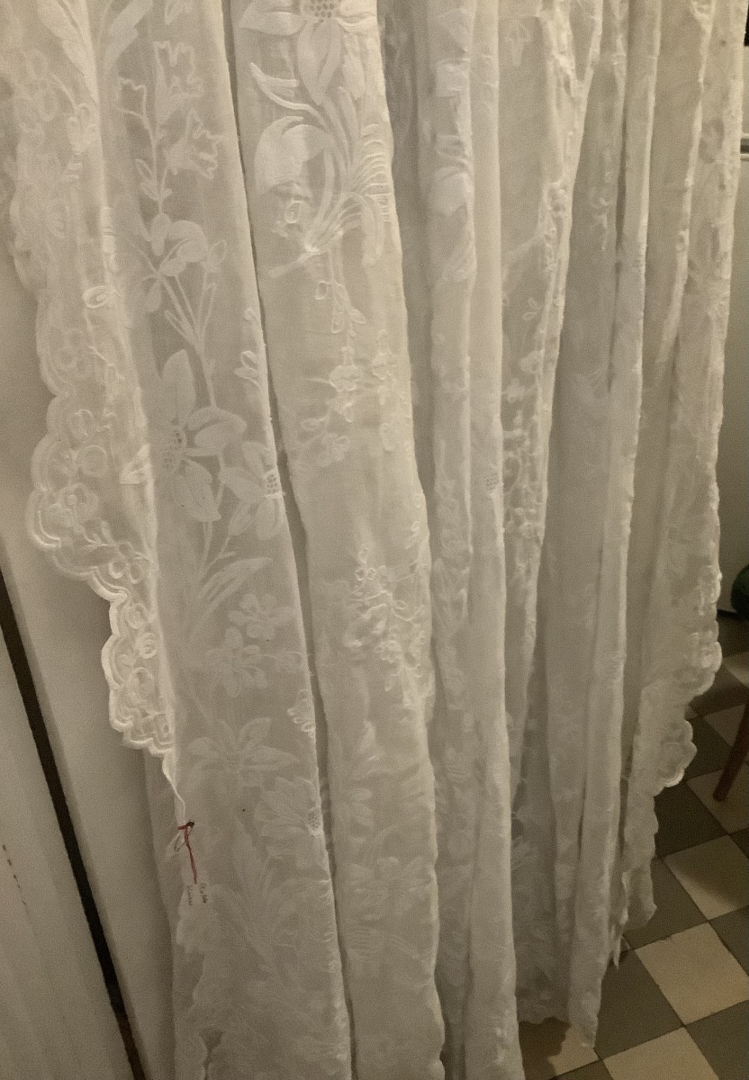 A Pair Of Cornely Lace Curtains