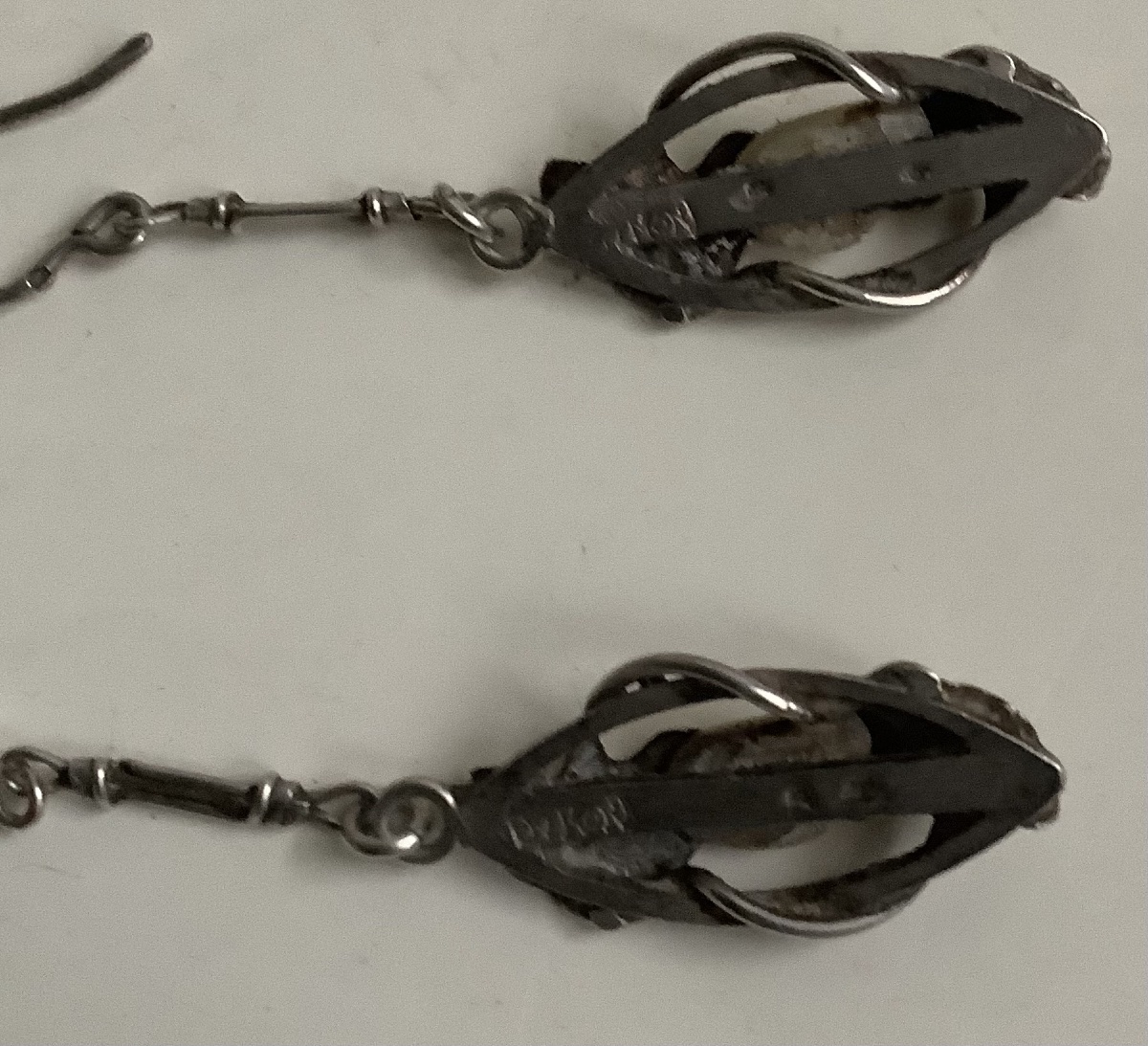 A Pair Of Silver Earrings By Paul Dumont, Featuring A Gingyo Design With A Pearl-photo-4