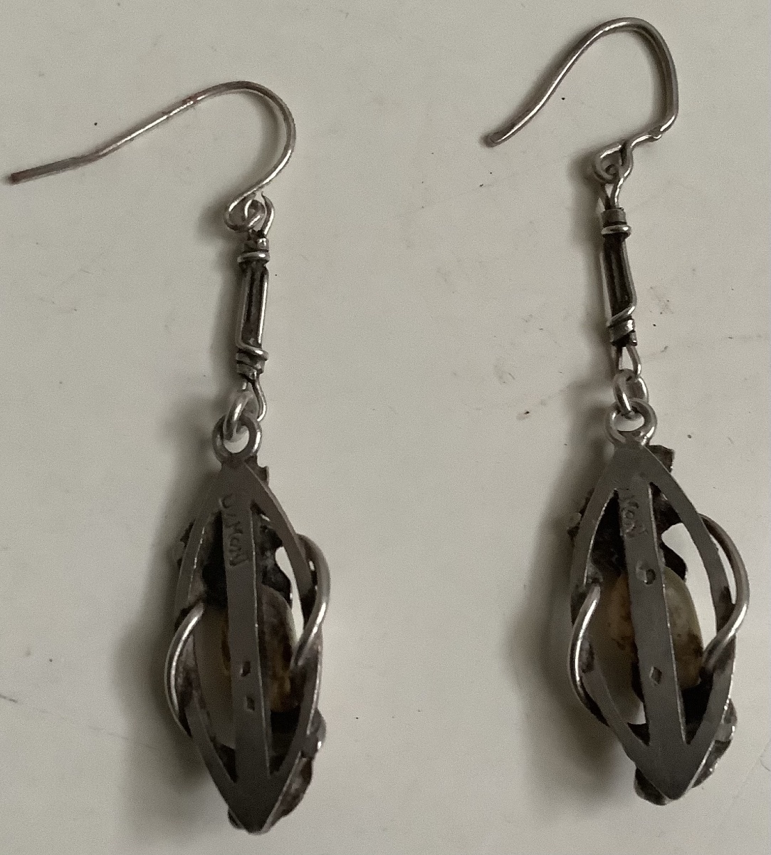 A Pair Of Silver Earrings By Paul Dumont, Featuring A Gingyo Design With A Pearl-photo-2