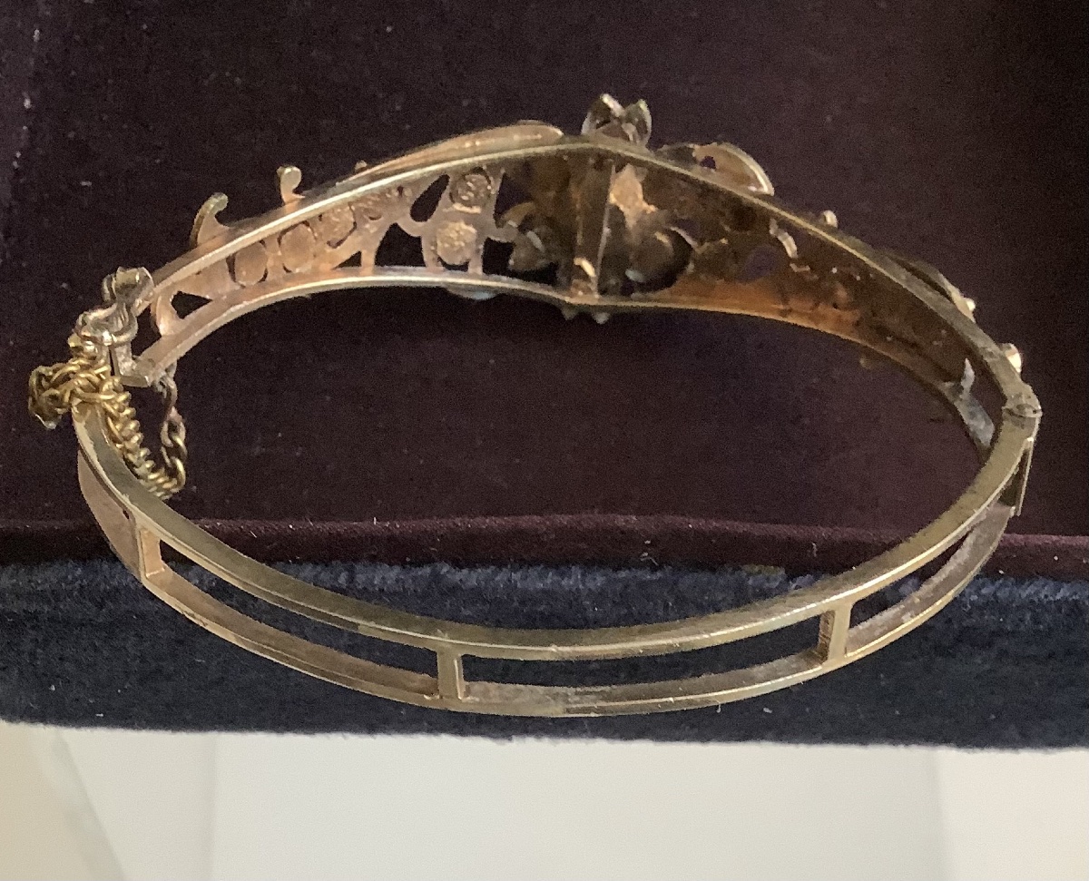 Bracelet en vermeil à decor repercé de feuillages sertis de pierres rouges et grenats-photo-1
