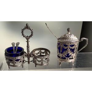 A Silver Mustard Pot With Its Shovel And A Silver Salt Bowl And Pepper Pot With 2 Shovels 