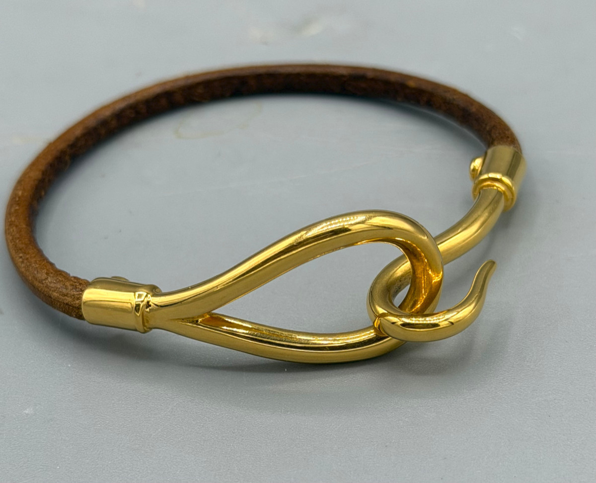 Bracelet "Jumbo" en métal doré et cuir Hermès Paris-photo-4