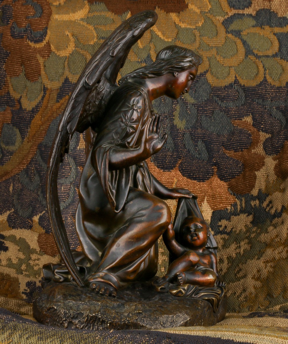 Ange agenouillé devant l'Enfant Jésus -photo-1