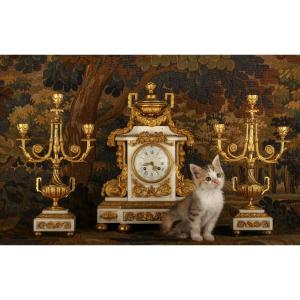 Pendule et ses deux candélabres 