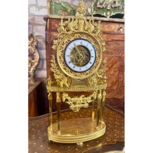 PENDULE PORTIQUE EN BRONZE RETOUR D’EGYPTE