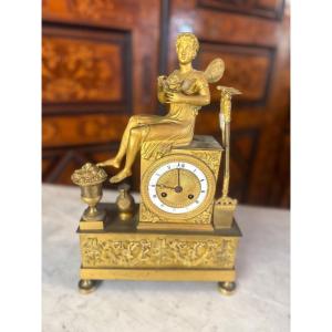 Clock From The Empire Period Decorated With An Antique Woman Allegorizing A Garden